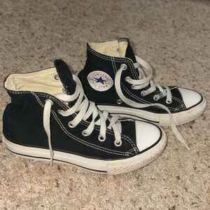 Youth black converse high tops.